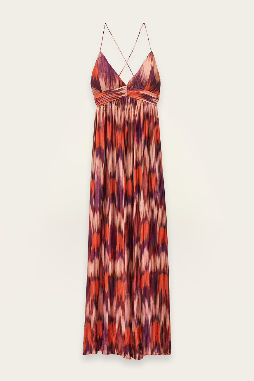 Long patterned dress with thin straps on a white background