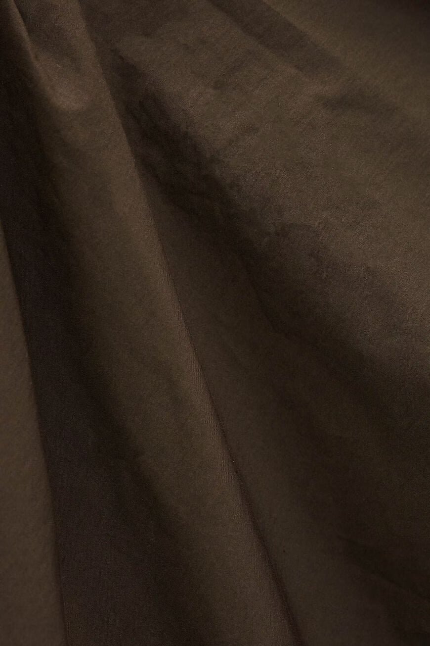 Close-up of brown fabric with visible texture