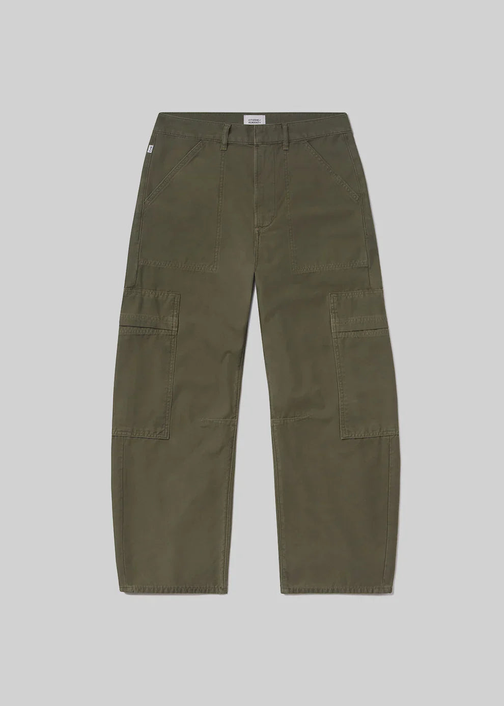Green cargo pants on a light gray background