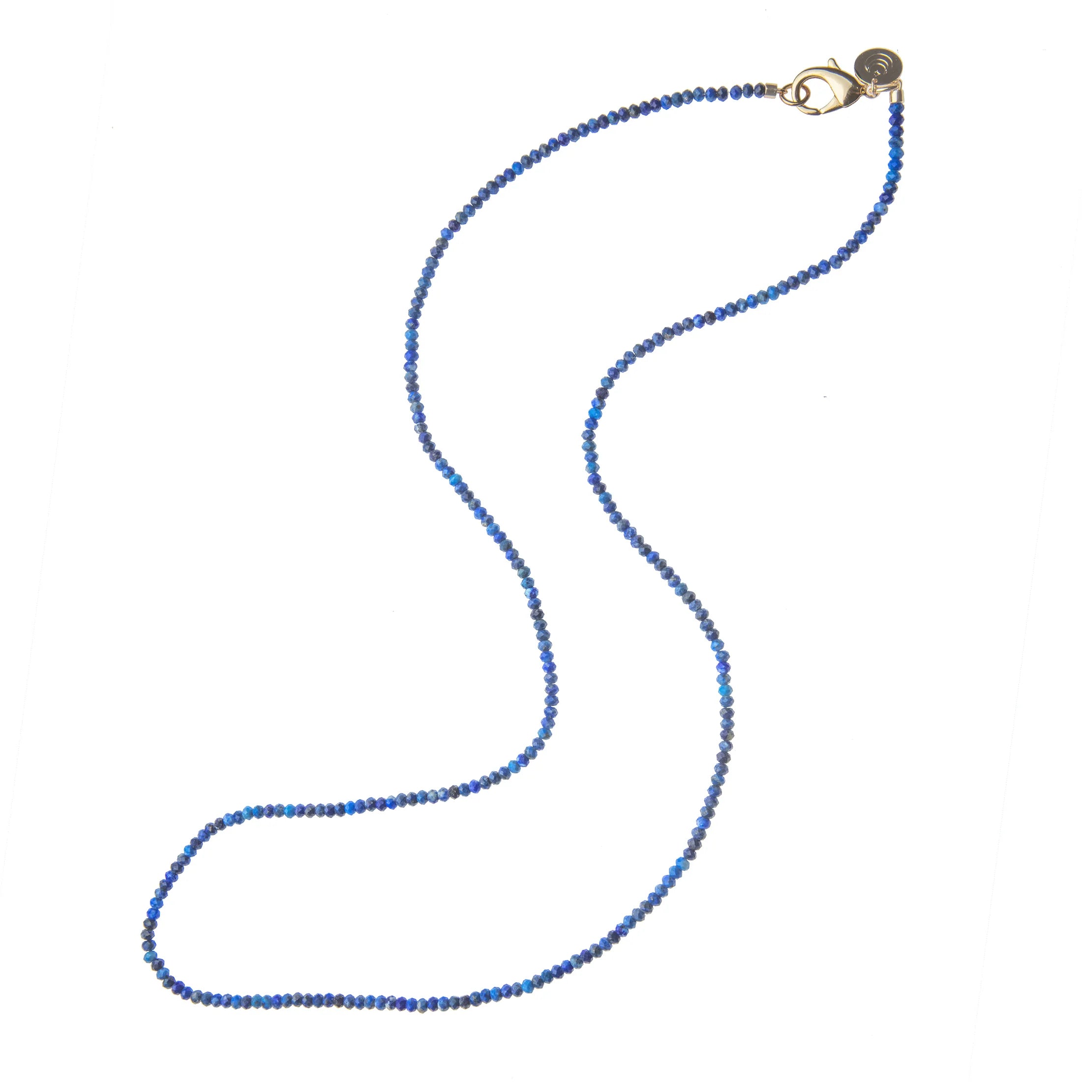 Blue beaded necklace on a white background