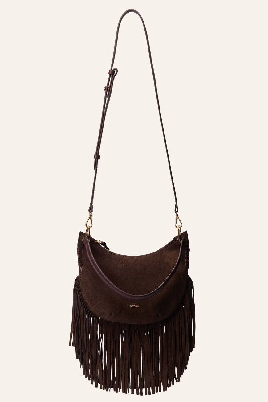 Brown suede handbag with fringe details on a white background