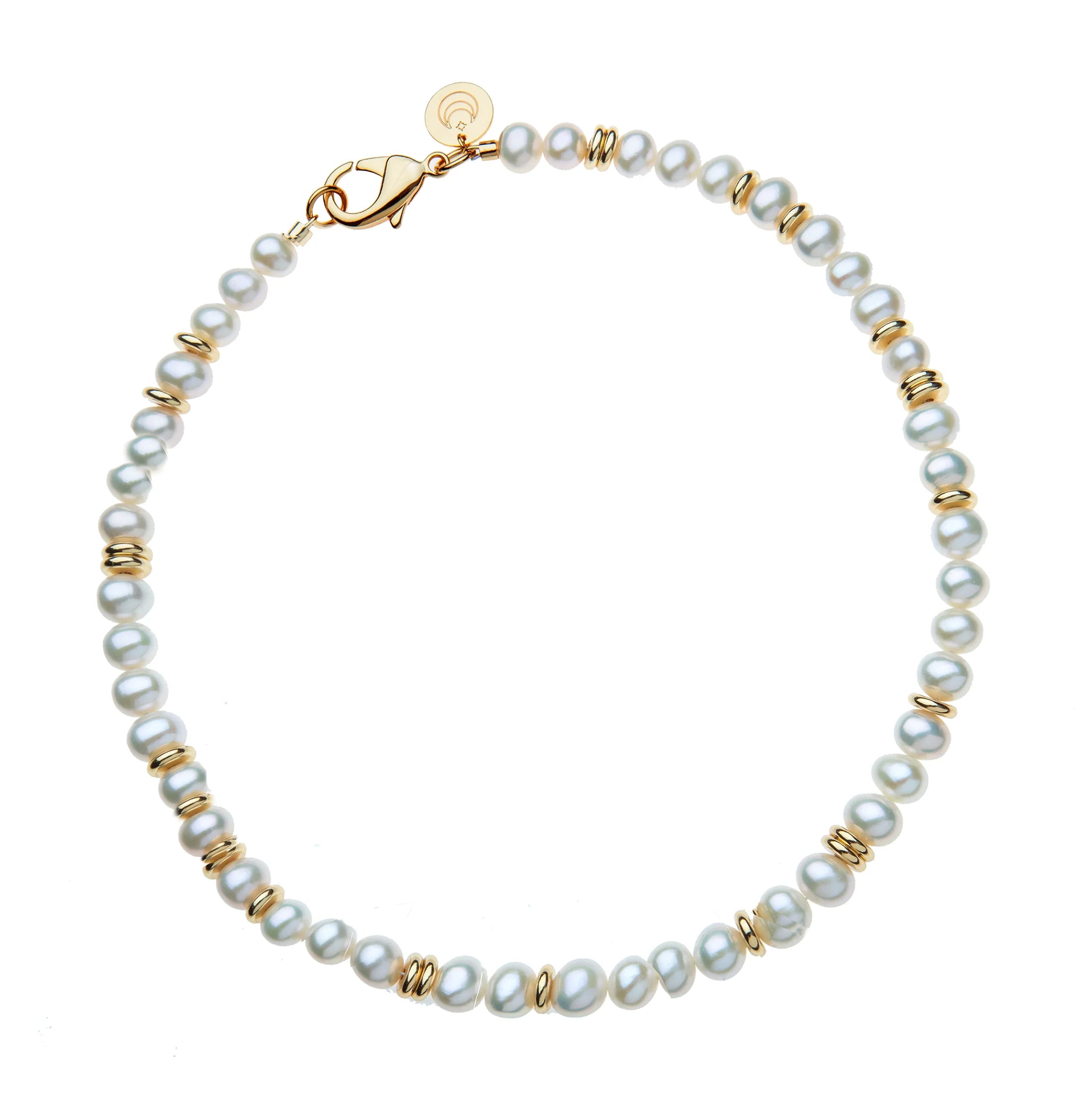 Pearl bracelet with gold accents on a white background