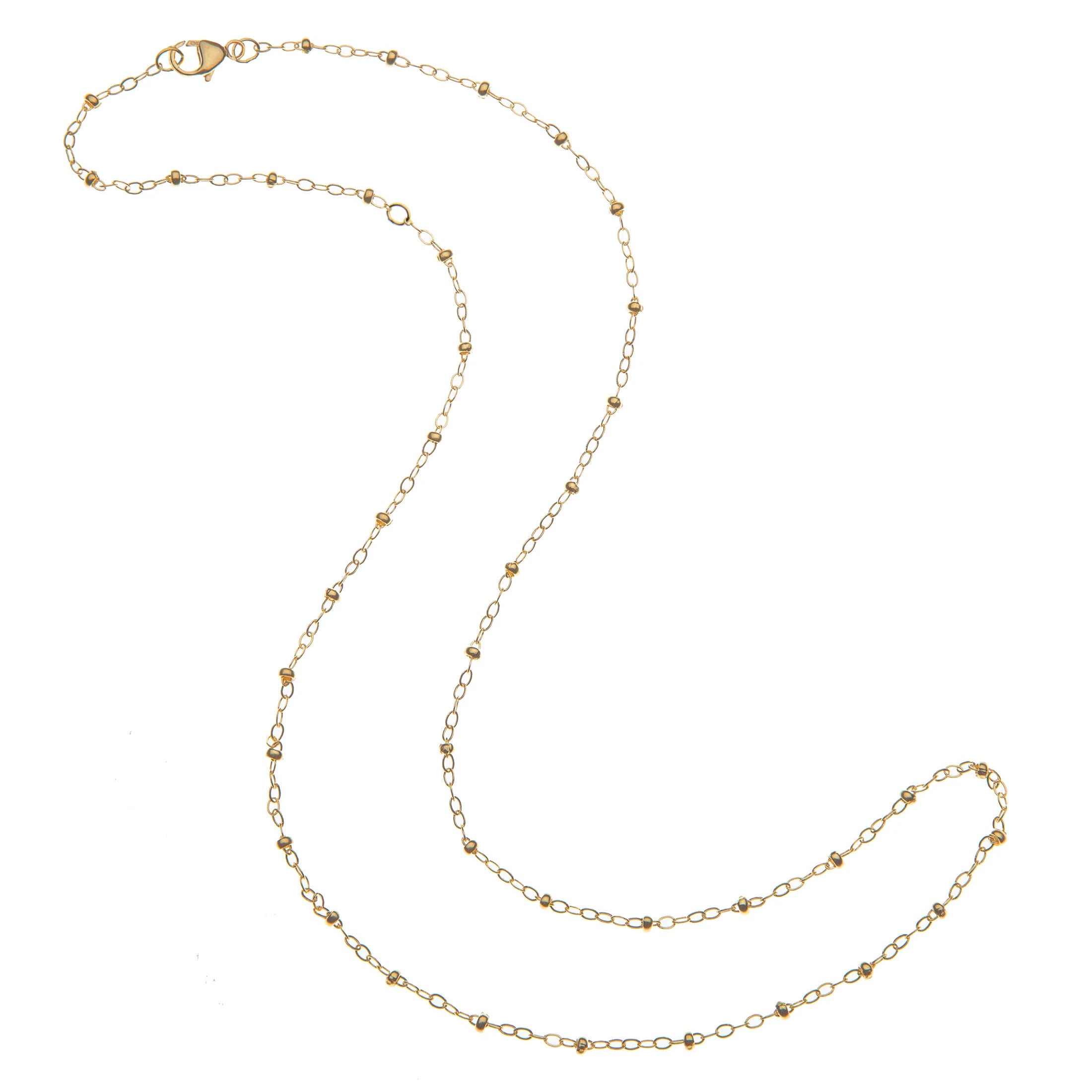 Gold chain necklace on a white background