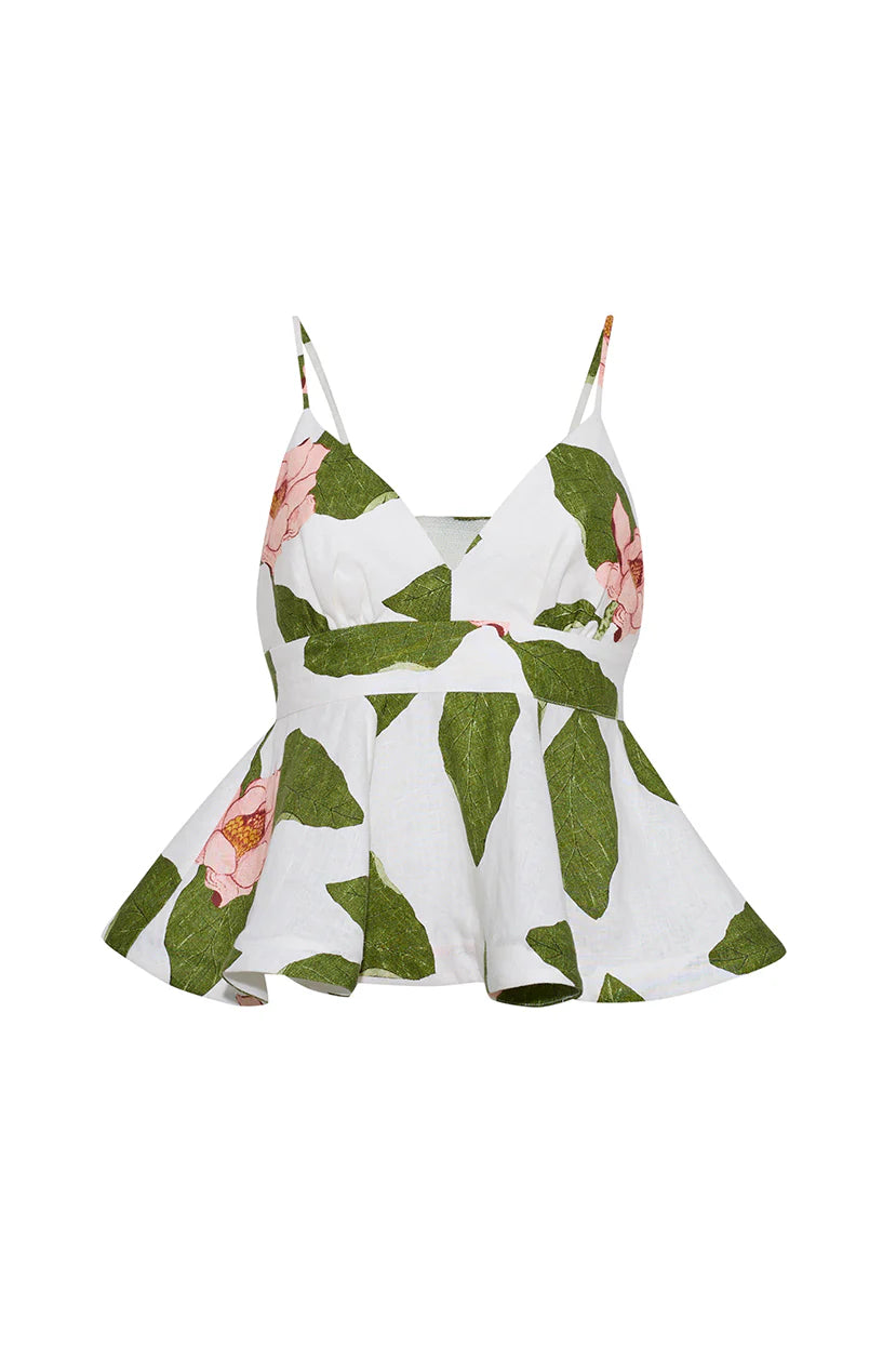 Floral and leaf patterned dress on a white background