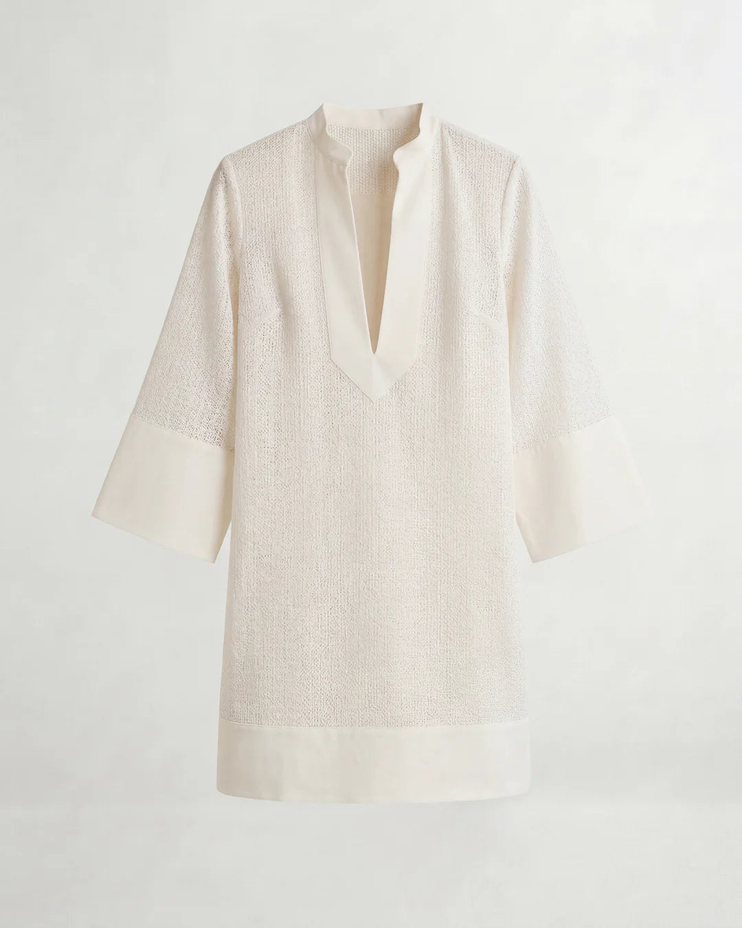 Beige linen shirt on a light gray background