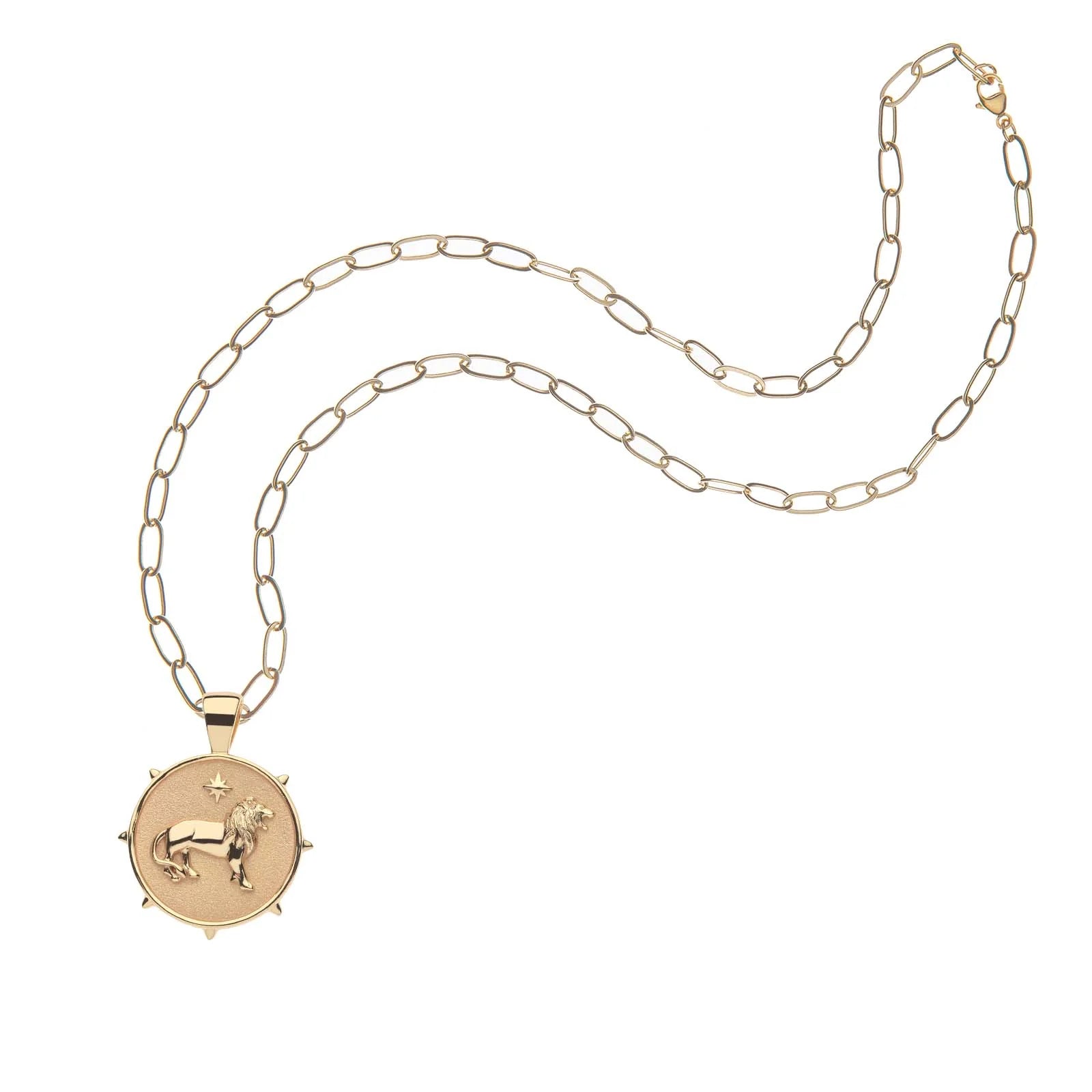Gold necklace with a unicorn pendant on a white background