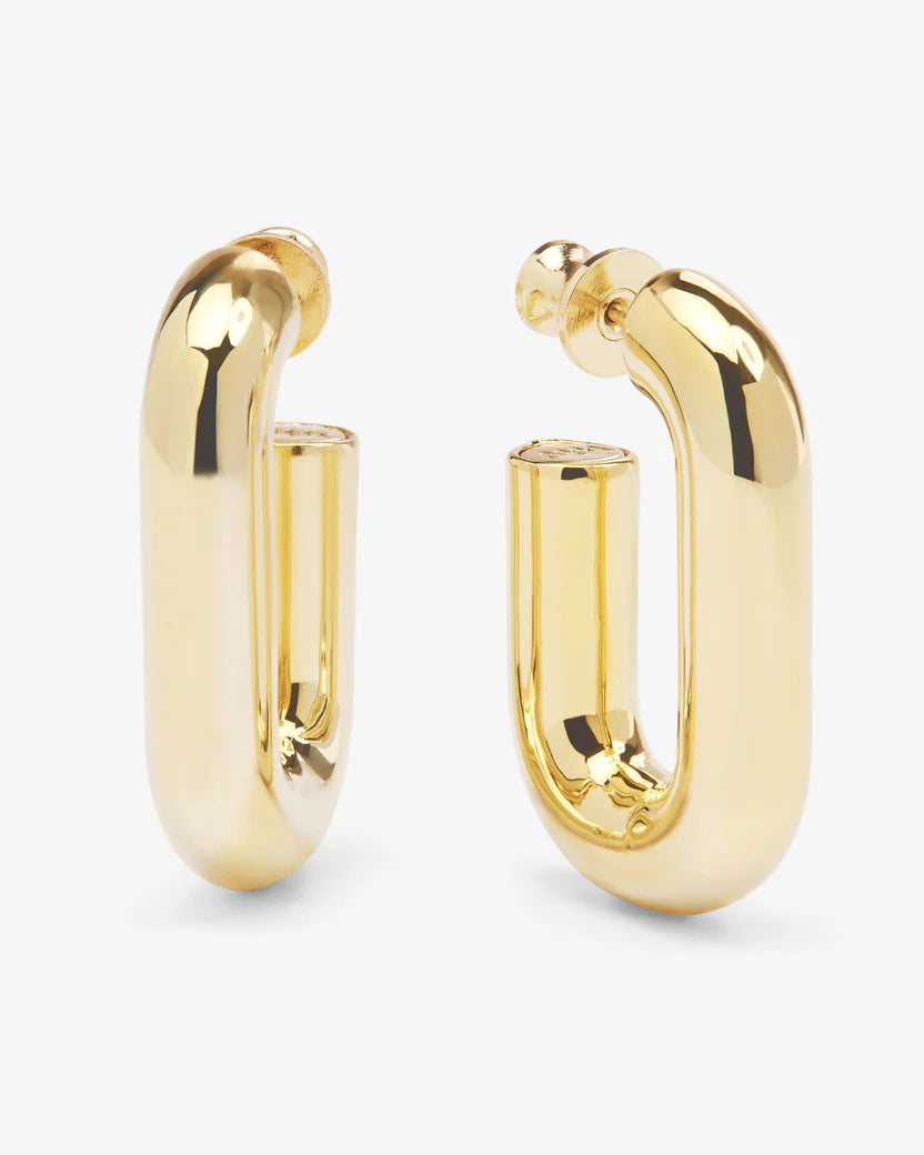 Gold hoop earrings on a white background
