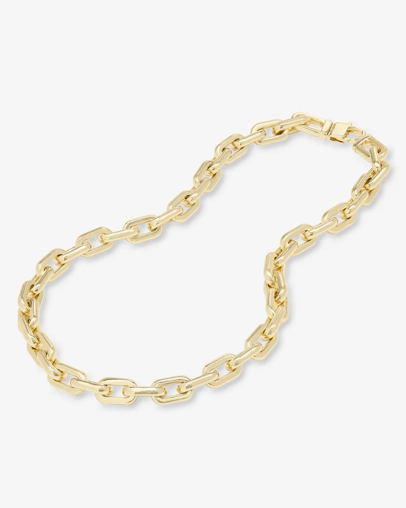 Gold chain bracelet on a white background