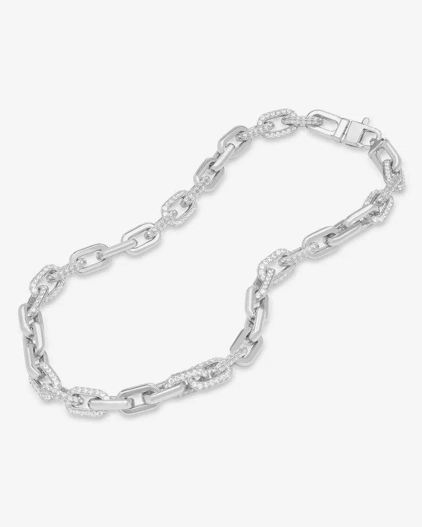 Silver chain bracelet on a white background