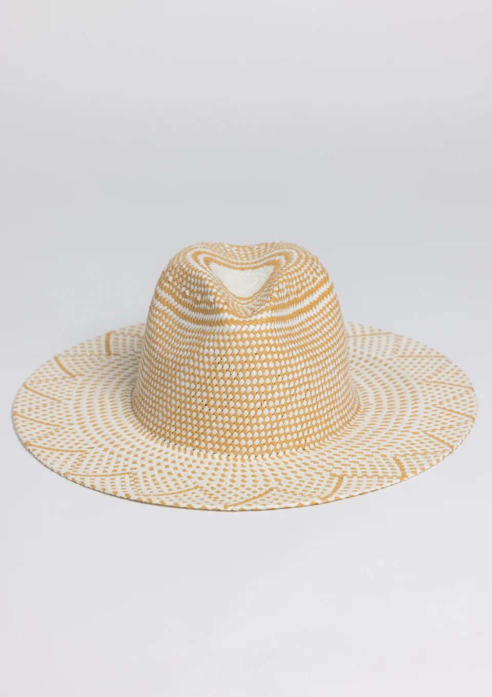 Woven straw hat on a light gray background