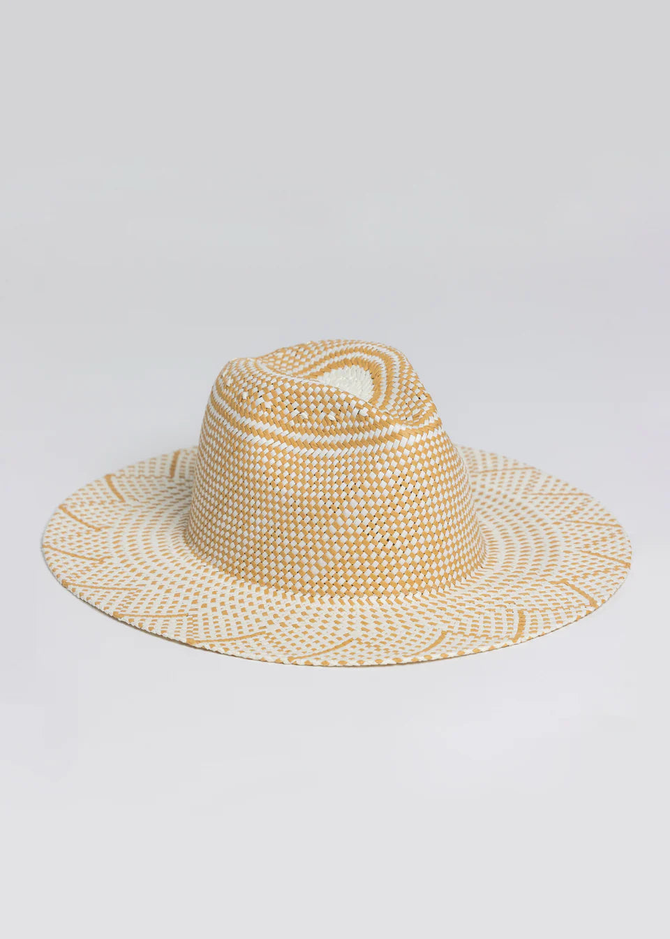 Woven straw hat on a light gray background