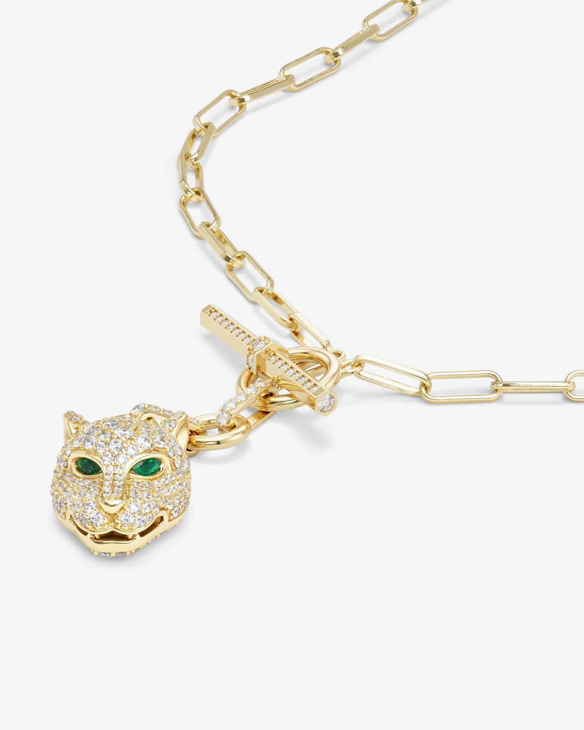 Gold necklace with a panther pendant on a white background