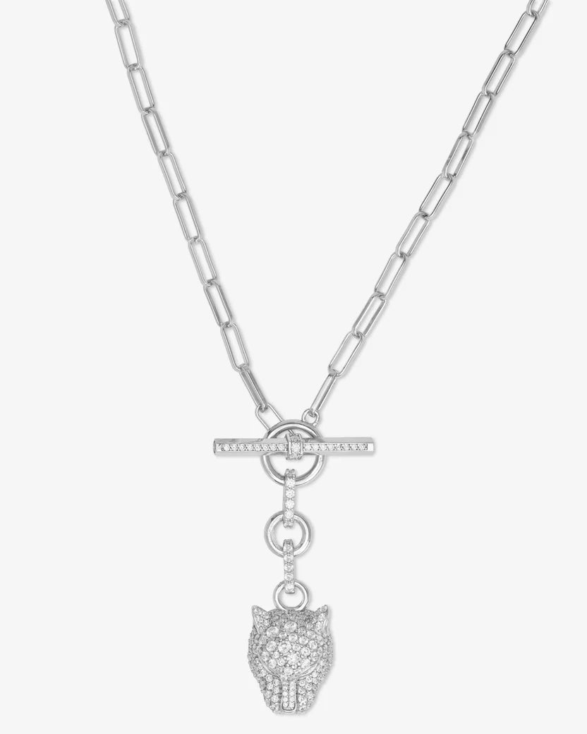 Silver necklace with a detailed pendant on a white background
