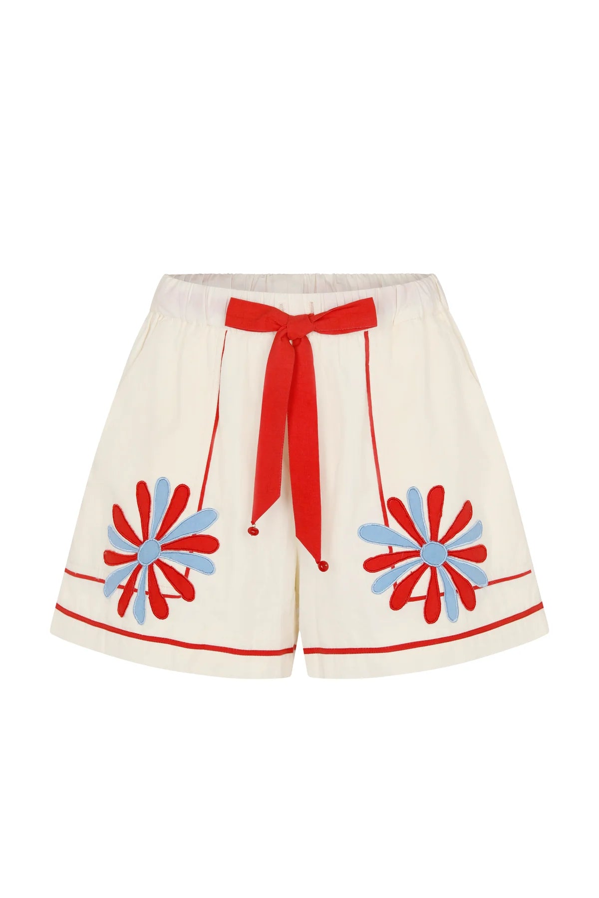 Beige shorts with red and blue floral patterns on a white background