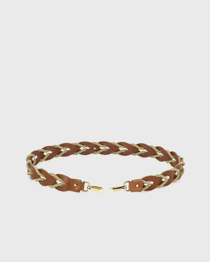 Braided leather belt with gold accents on a light gray background