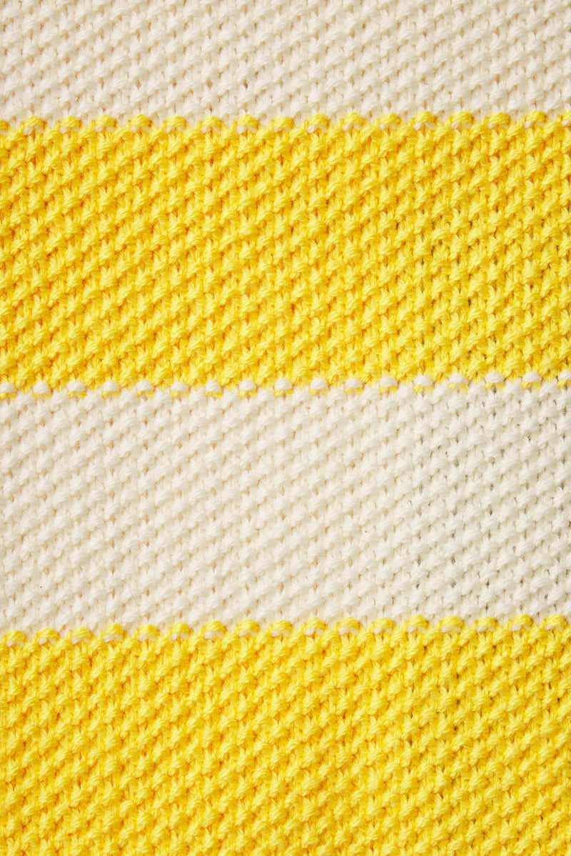 Close-up of fabric with yellow and beige stripes