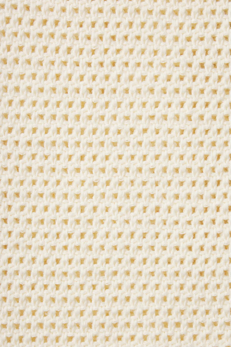 Close-up of a textured beige fabric pattern