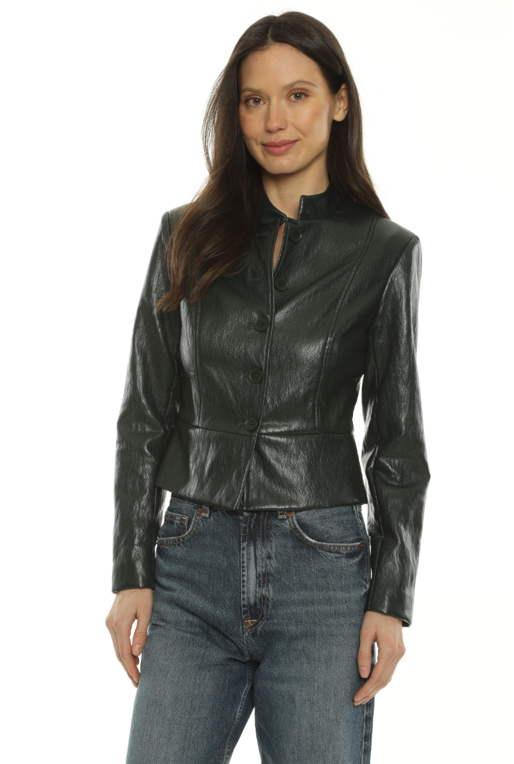 A woman modeling a black faux-leather cropped jacket with a high stand collar and front zipper, paired with blue jeans, against a plain white background.
