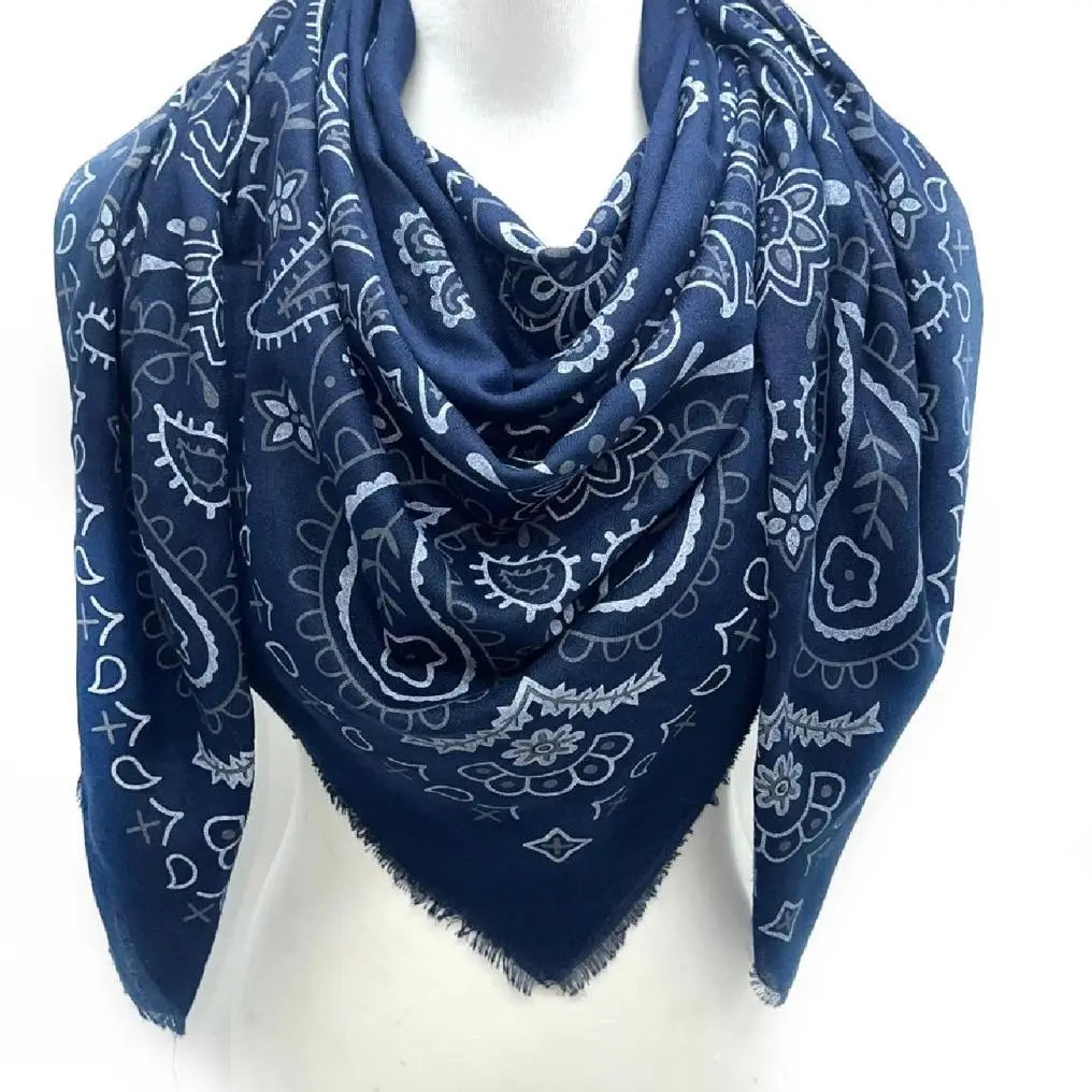 Navy blue bandana with white patterns on a mannequin