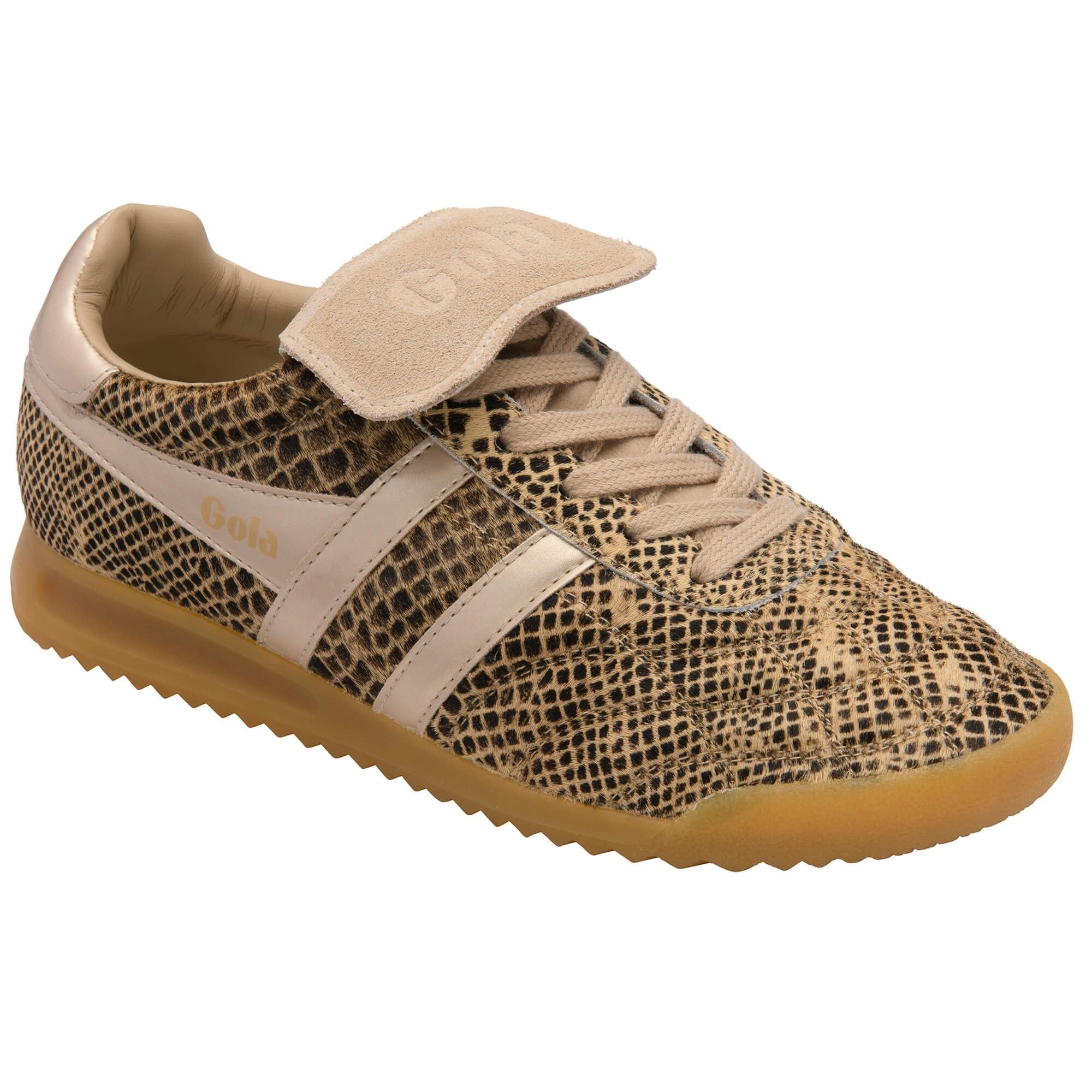 Beige sneaker with snake pattern on a white background