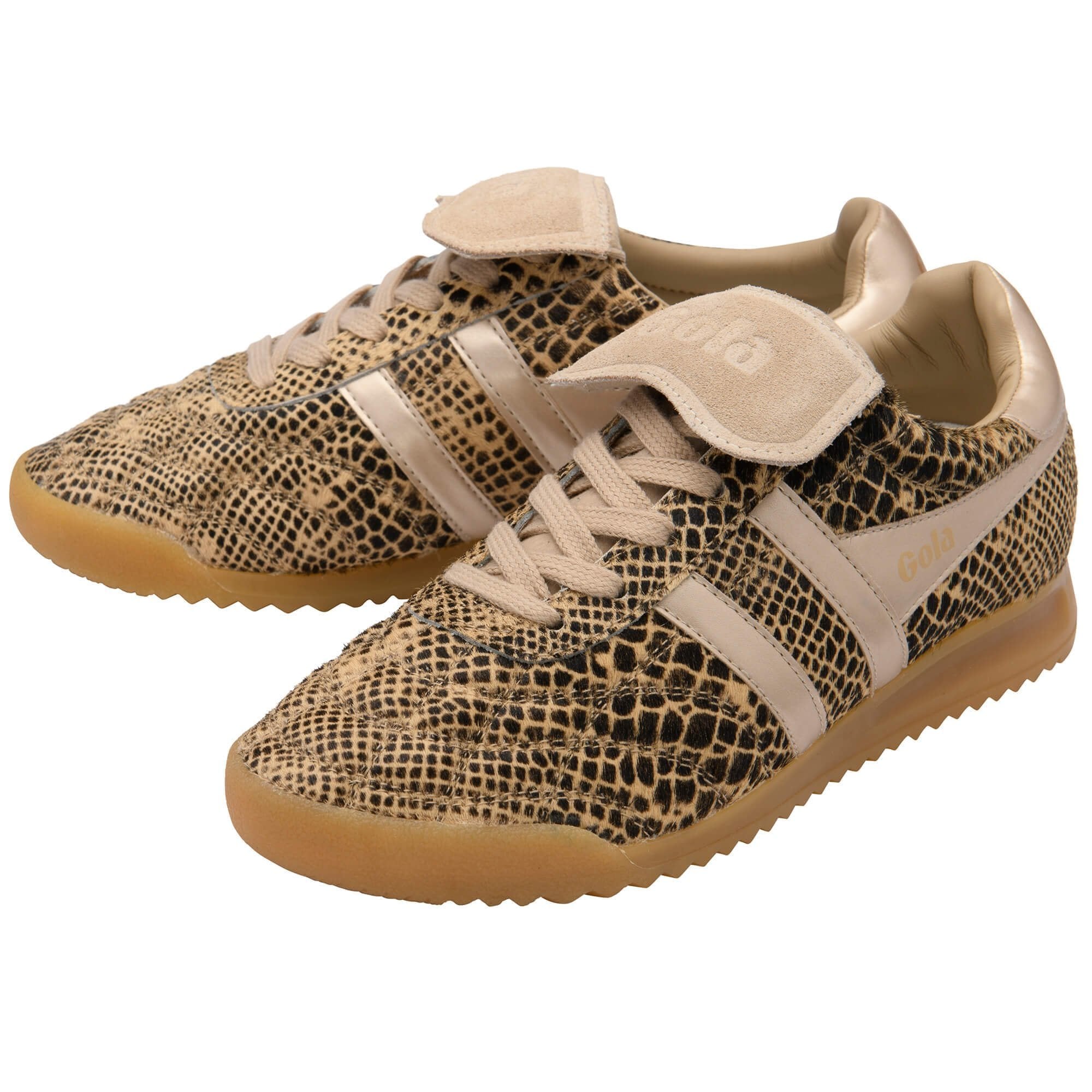 Pair of snakeskin-patterned sneakers with beige accents on a white background