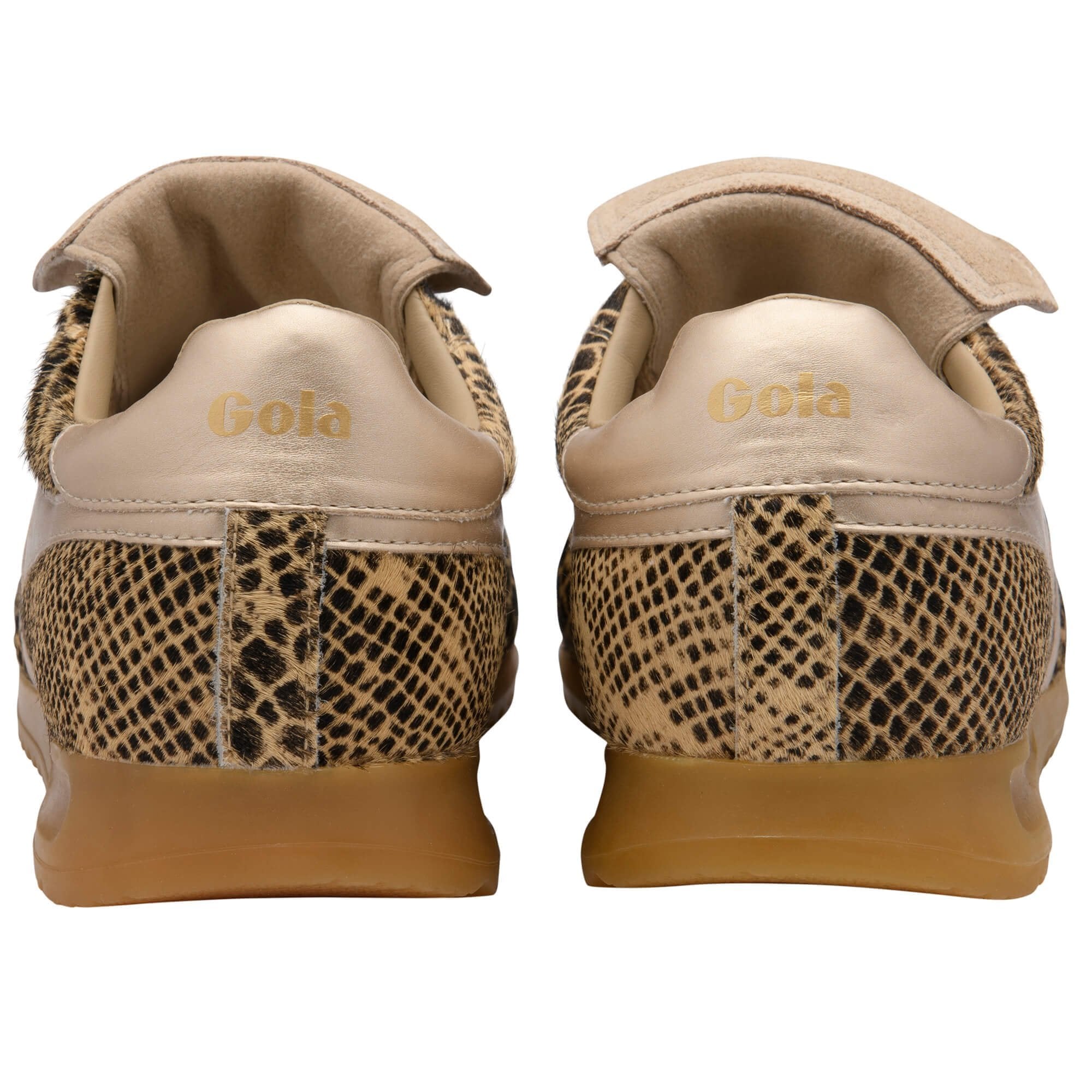 Pair of Gola shoes with snake print soles on a white background