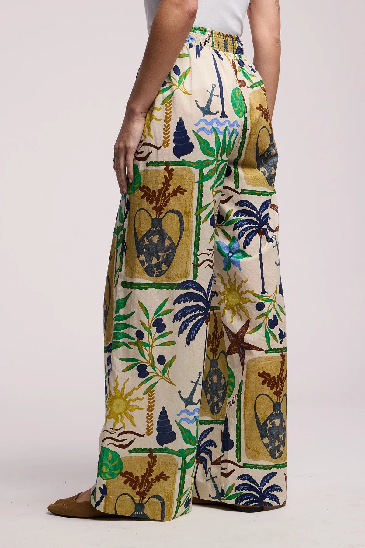 Colorful patterned pants with a neutral background
