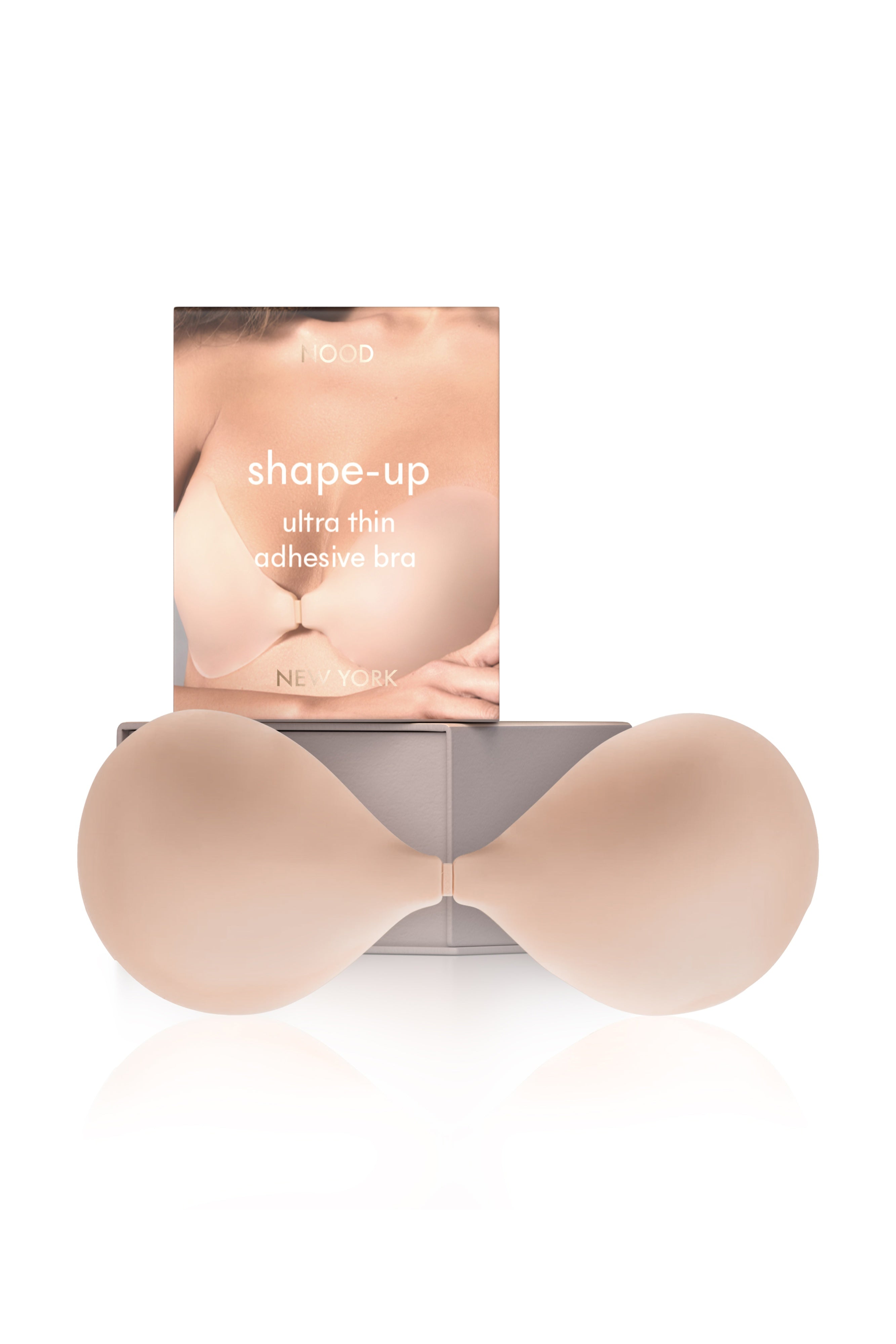 N shaped silicone bralette with packaging labeled 'shape-up' on a white background