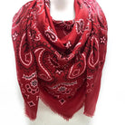 Red bandana patterned scarf on a white background