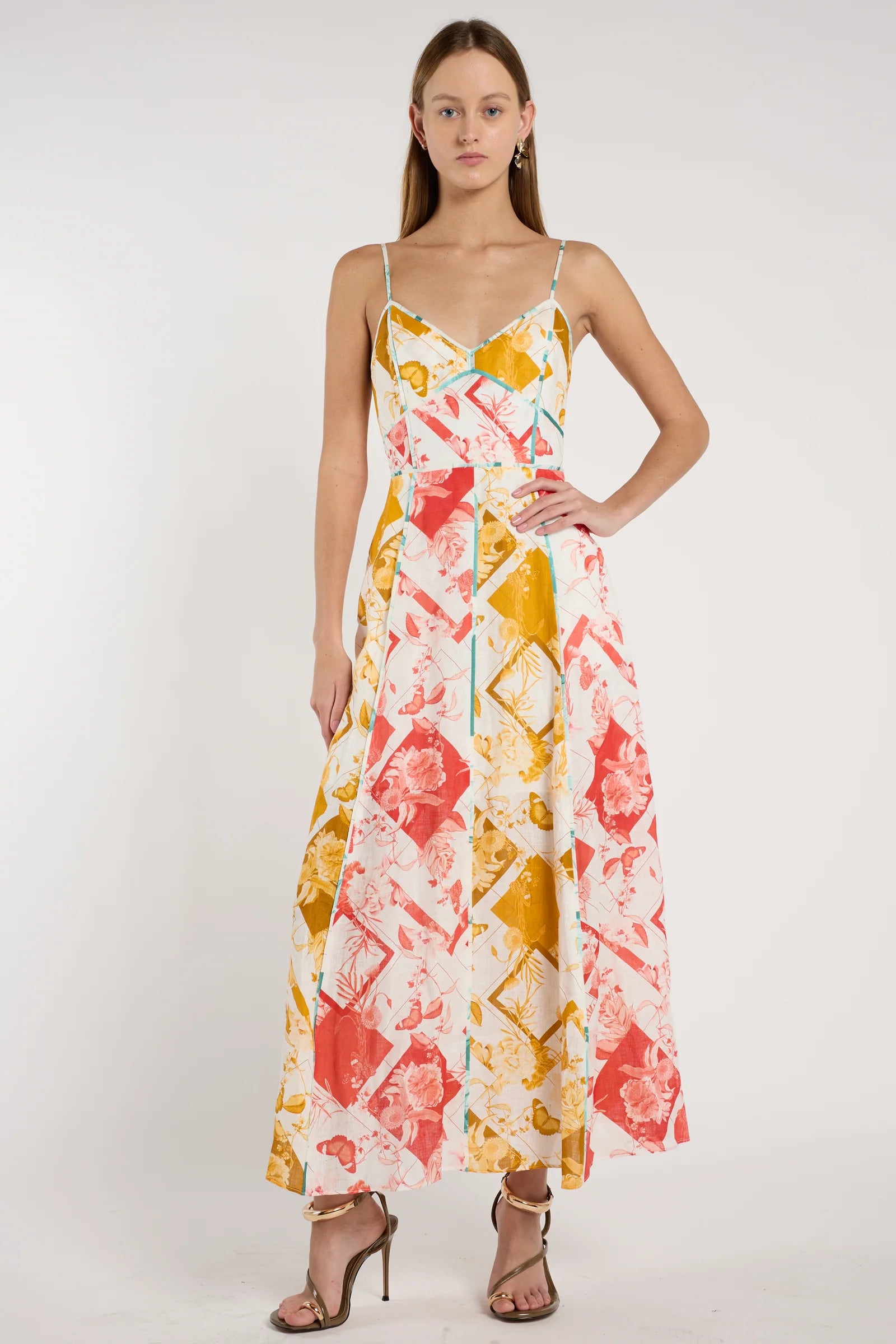 Woman wearing a floral dress on a white background