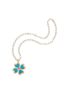 Necklace with a butterfly pendant featuring blue wings and a red gemstone on a white background