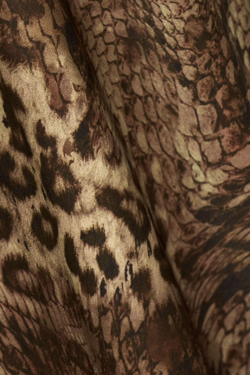 Close-up of fabric with a brown and beige pattern