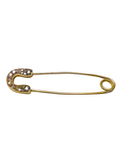 Gold safety pin with embedded stones on a white background