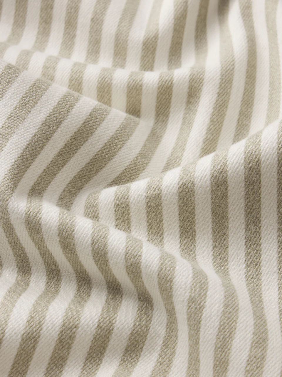 Close-up of beige and white striped fabric
