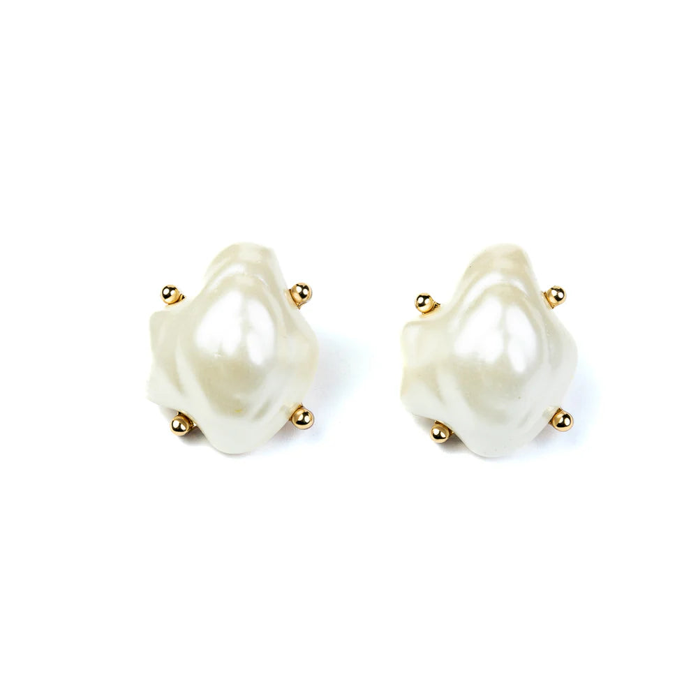 Pair of pearl earrings with gold accents on a white background