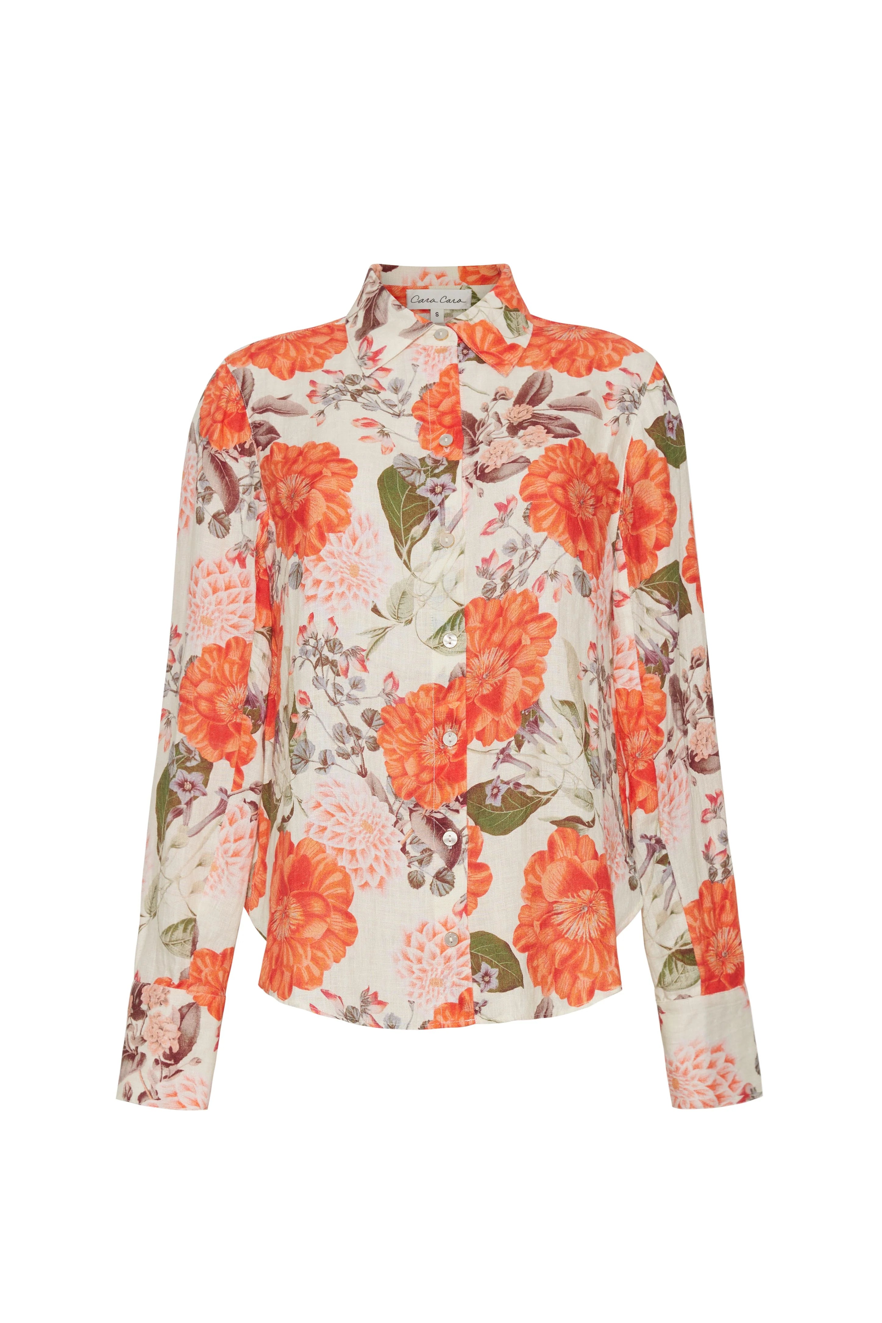 Floral blouse with orange flowers on a white background