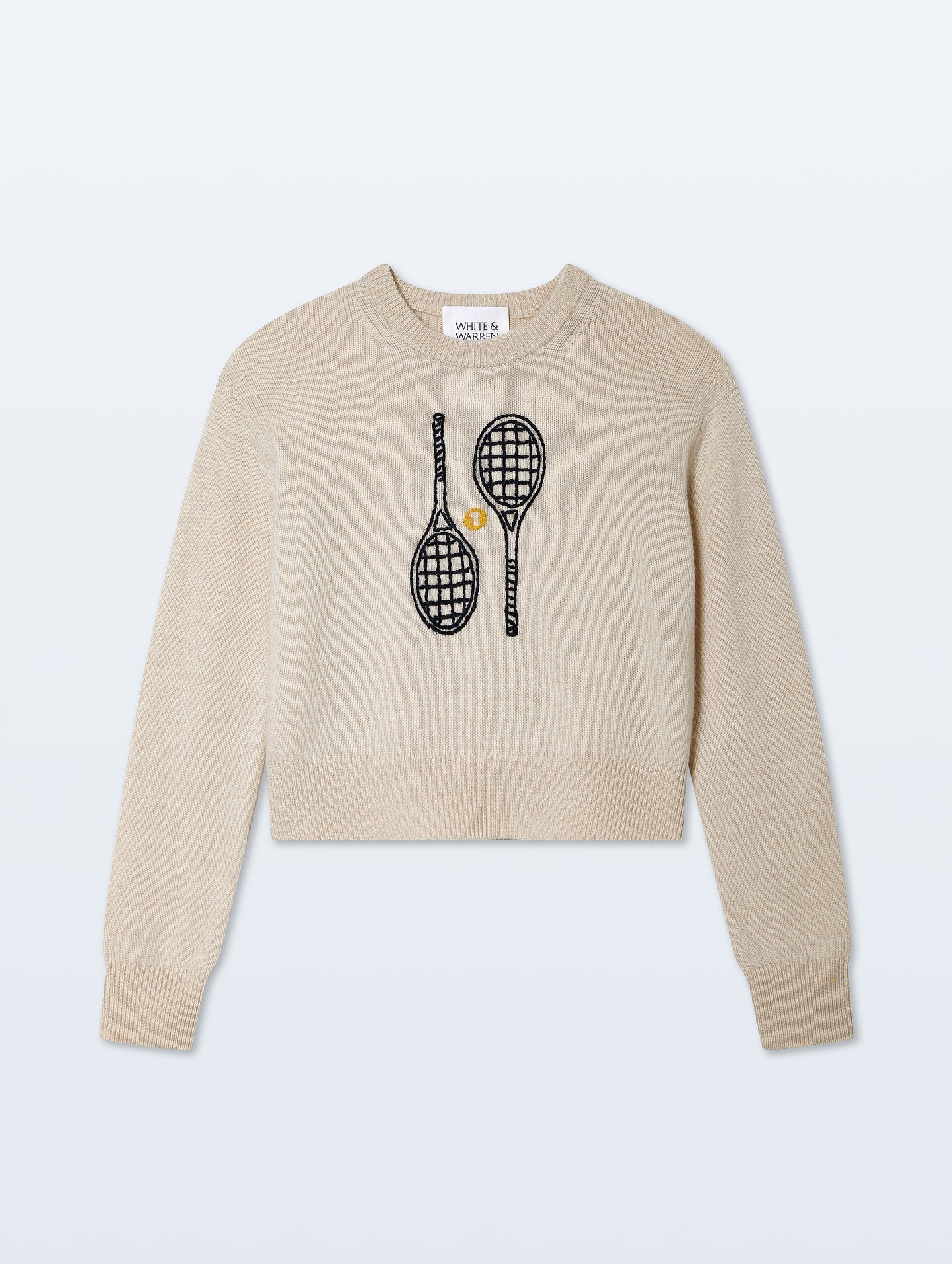 Beige sweater with tennis racket design on a white background