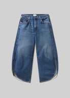 Blue jeans on a gray background
