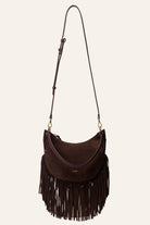Brown suede handbag with fringe details on a white background