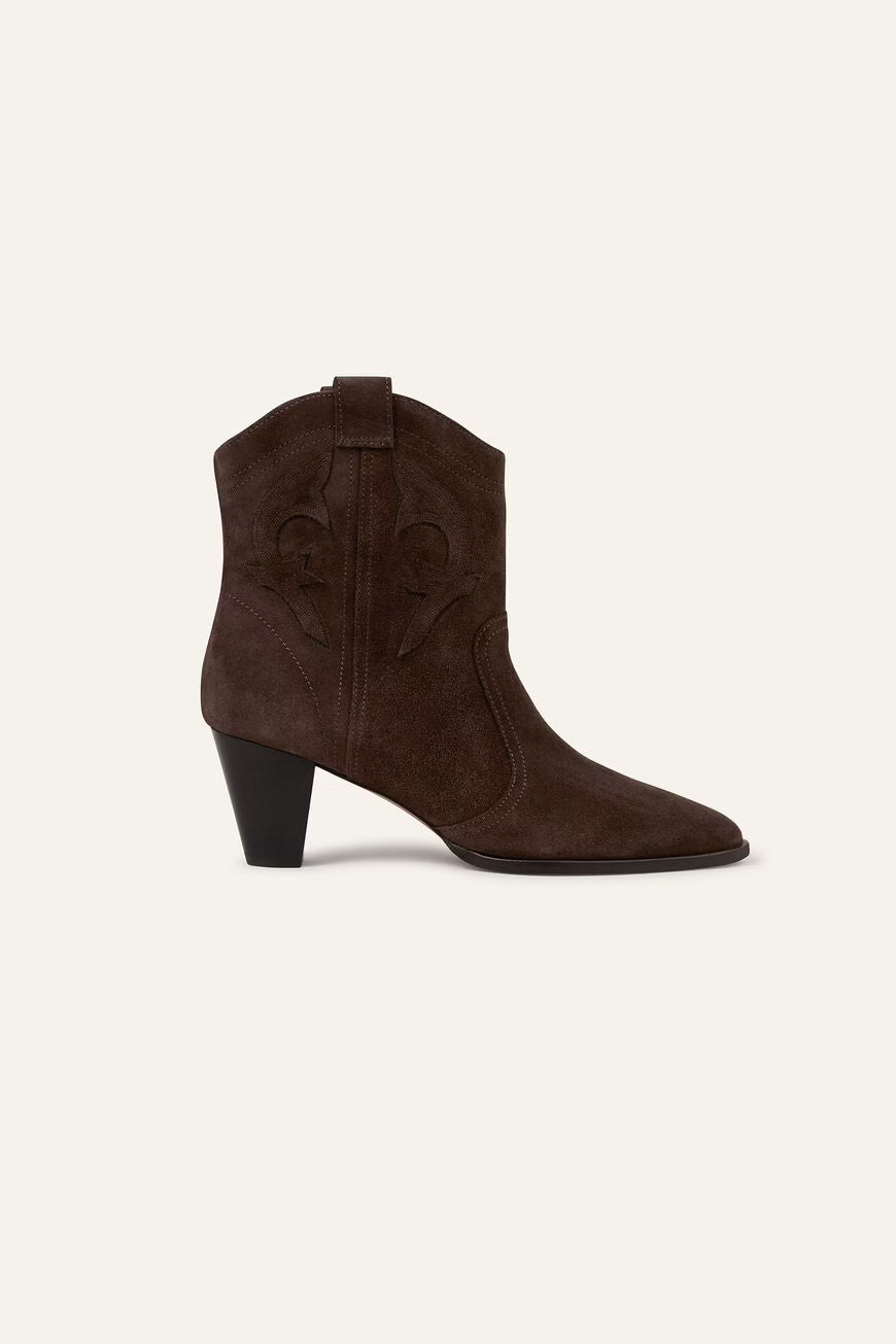 Maroon cowboy boot on a white background