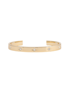 Gold bracelet with small diamonds on a white background