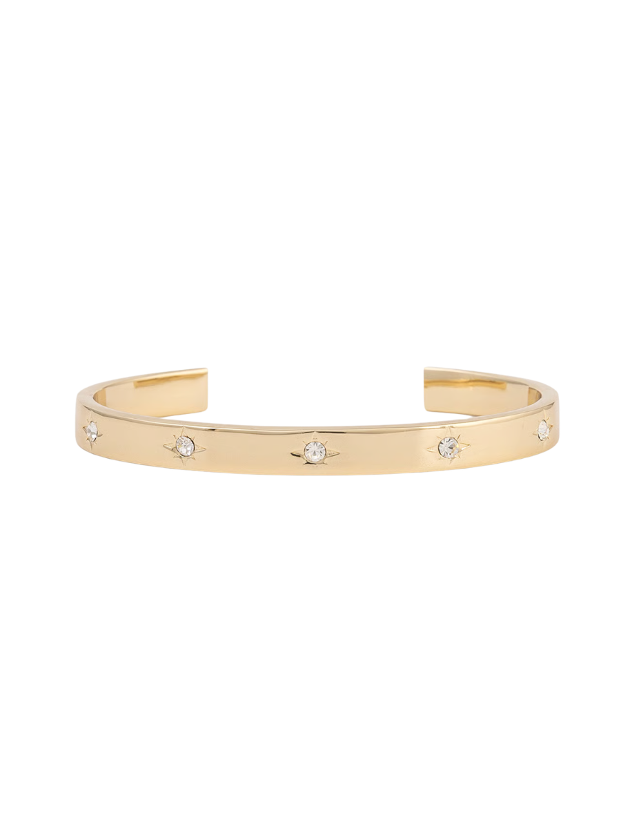 Gold bracelet with small diamonds on a white background
