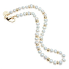 Pearl necklace with gold clasp on a white background