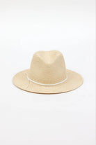 Beige straw hat with a white band on a white background