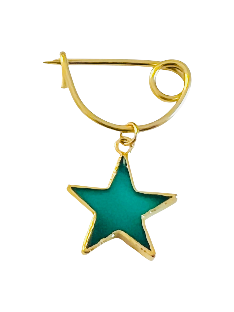Gold earring with a green star-shaped pendant on a white background