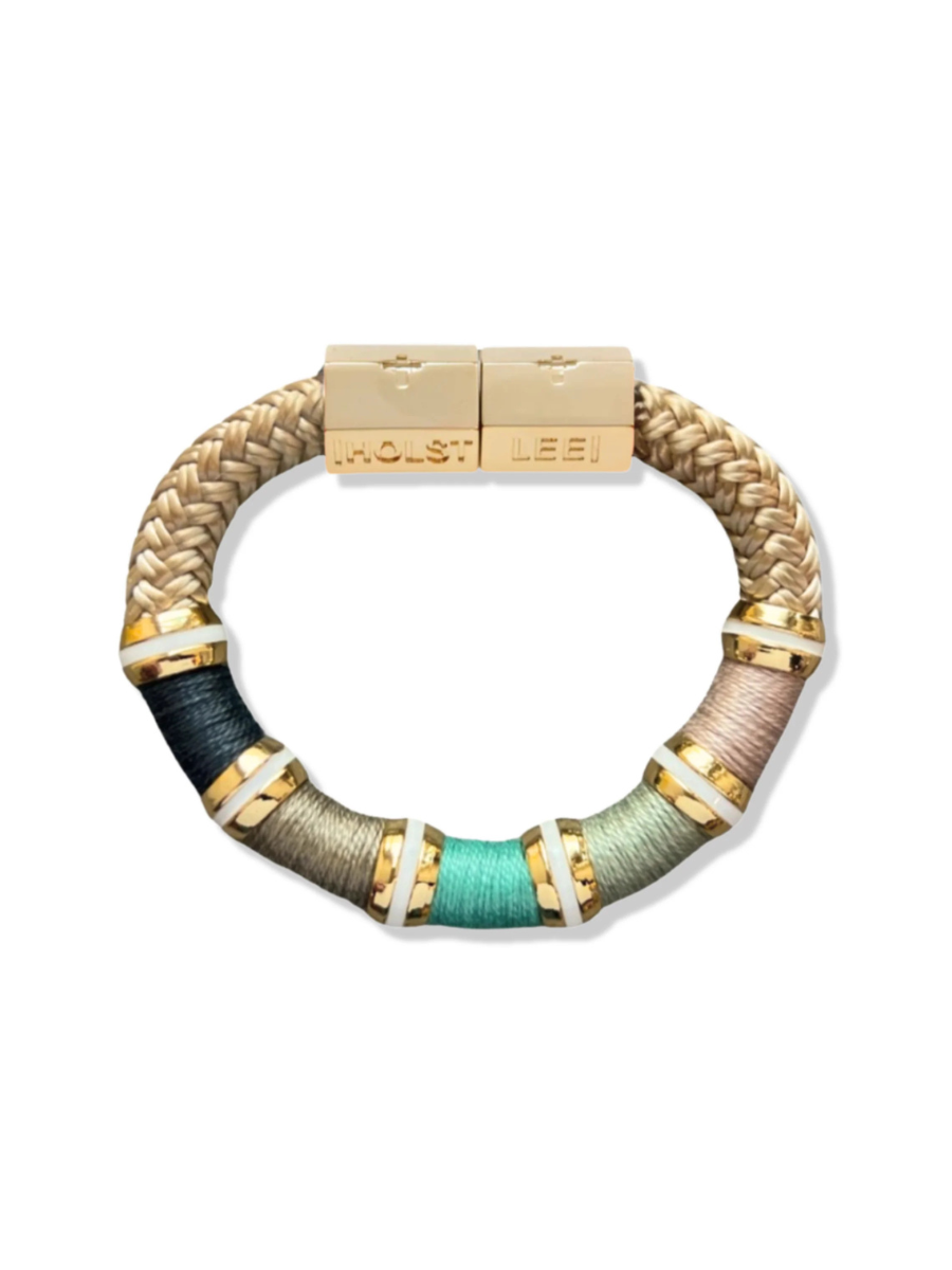 Multicolored braided bracelet with a beige clasp on a white background