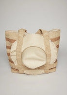 Woven bag with a textured surface on a light gray background