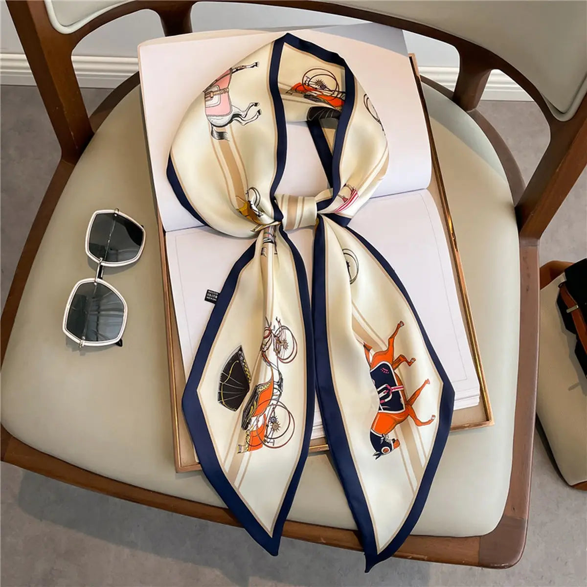 Decorative scarf with artistic designs on a chair