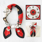 Red, black, and white patterned scarf with decorative elements on a white background