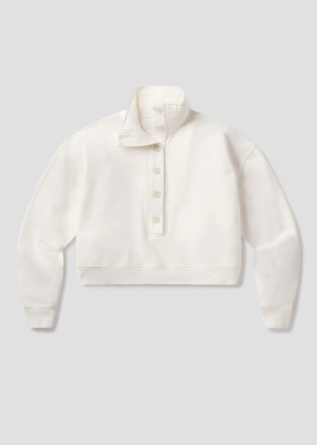White fleece jacket on a light gray background